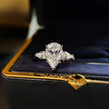 【007】Niche design light luxury angel water drop zircon three stone ring women's luxury pear-shaped pigeon egg wedding ring open ring women