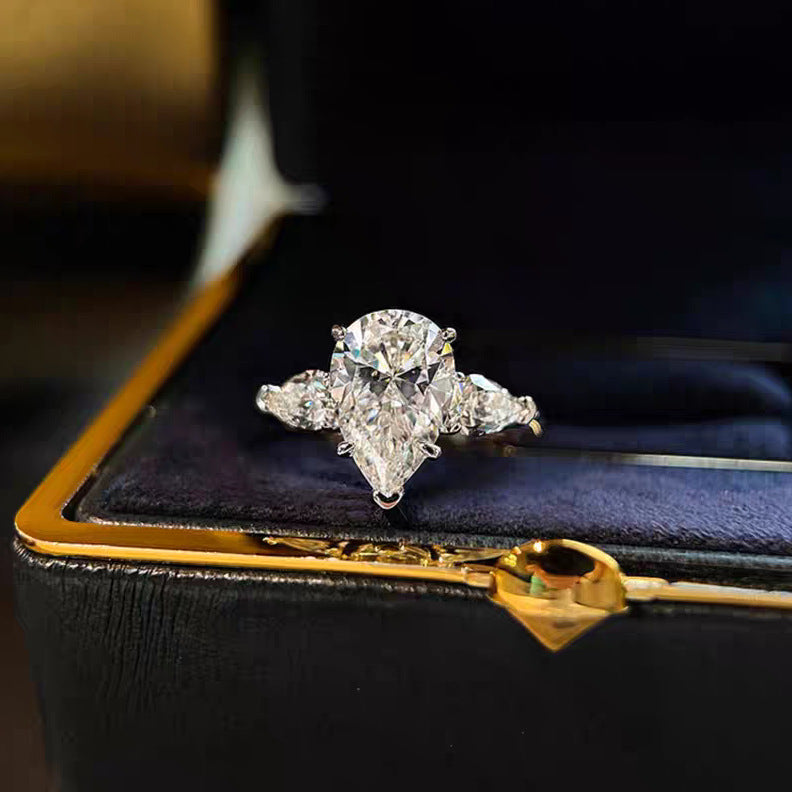 【007】Niche design light luxury angel water drop zircon three stone ring women's luxury pear-shaped pigeon egg wedding ring open ring women