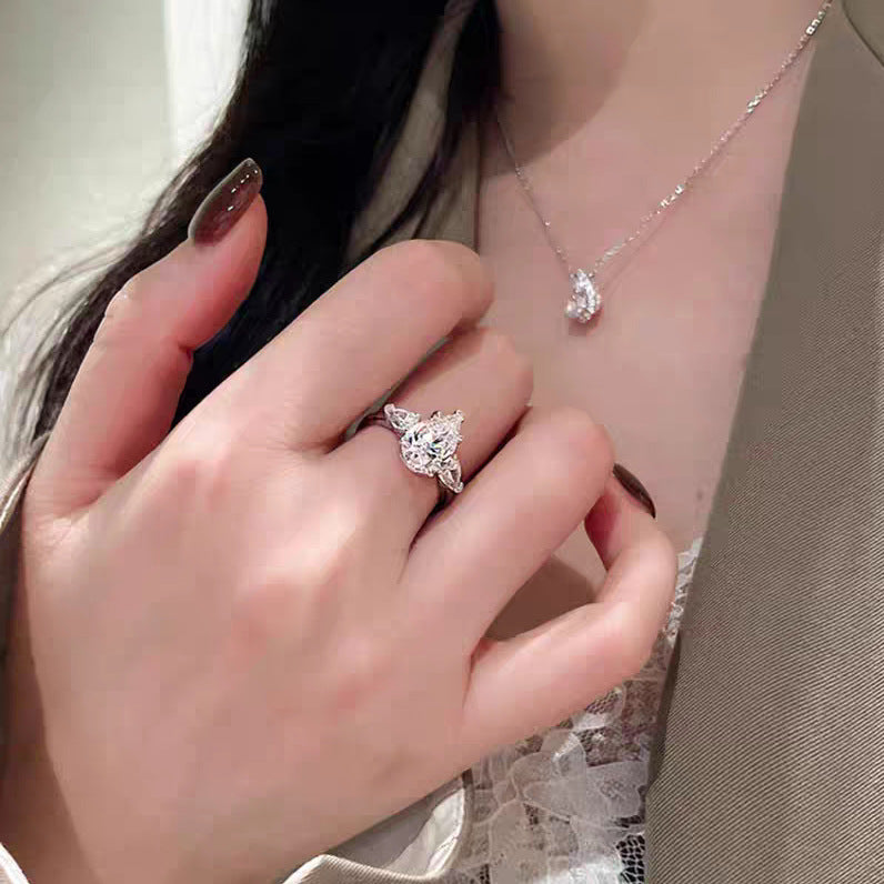 【007】Niche design light luxury angel water drop zircon three stone ring women's luxury pear-shaped pigeon egg wedding ring open ring women