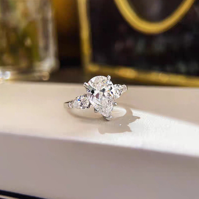 【007】Niche design light luxury angel water drop zircon three stone ring women's luxury pear-shaped pigeon egg wedding ring open ring women