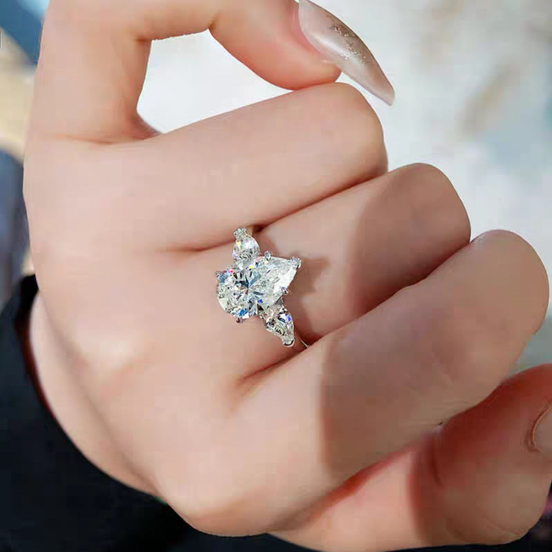 【007】Niche design light luxury angel water drop zircon three stone ring women's luxury pear-shaped pigeon egg wedding ring open ring women