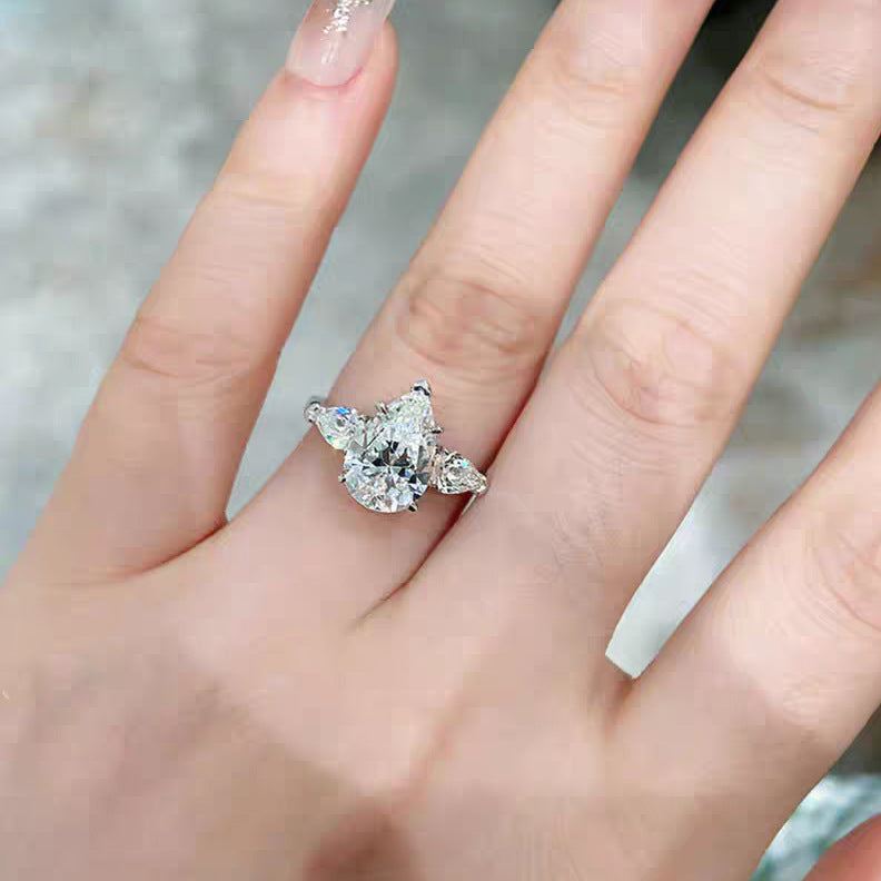 【007】Niche design light luxury angel water drop zircon three stone ring women's luxury pear-shaped pigeon egg wedding ring open ring women