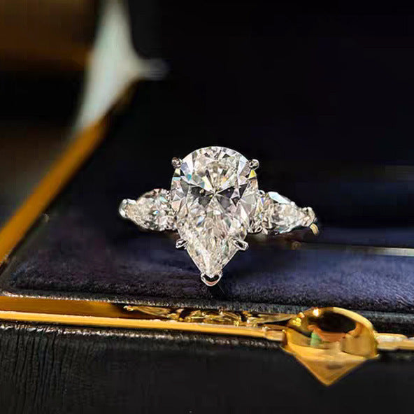 【007】Niche design light luxury angel water drop zircon three stone ring women's luxury pear-shaped pigeon egg wedding ring open ring women